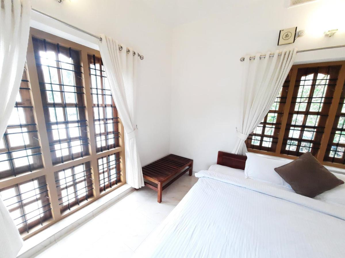 Oriole Homestay Теккади Экстерьер фото