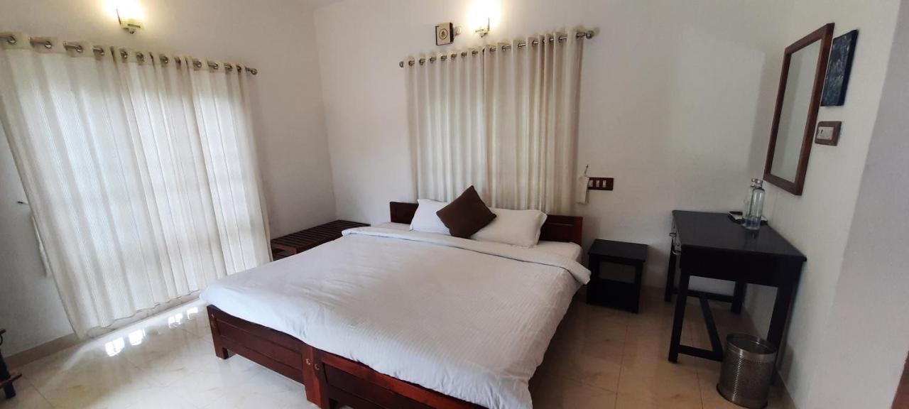 Oriole Homestay Теккади Экстерьер фото