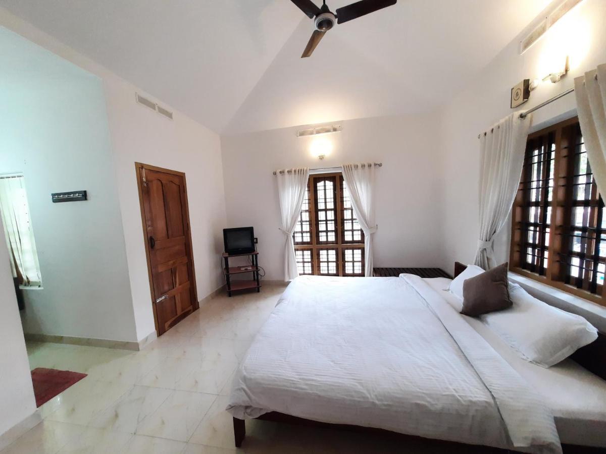 Oriole Homestay Теккади Экстерьер фото