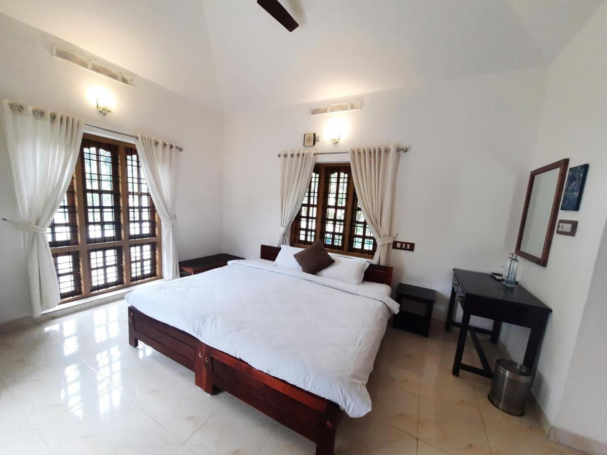 Oriole Homestay Теккади Экстерьер фото