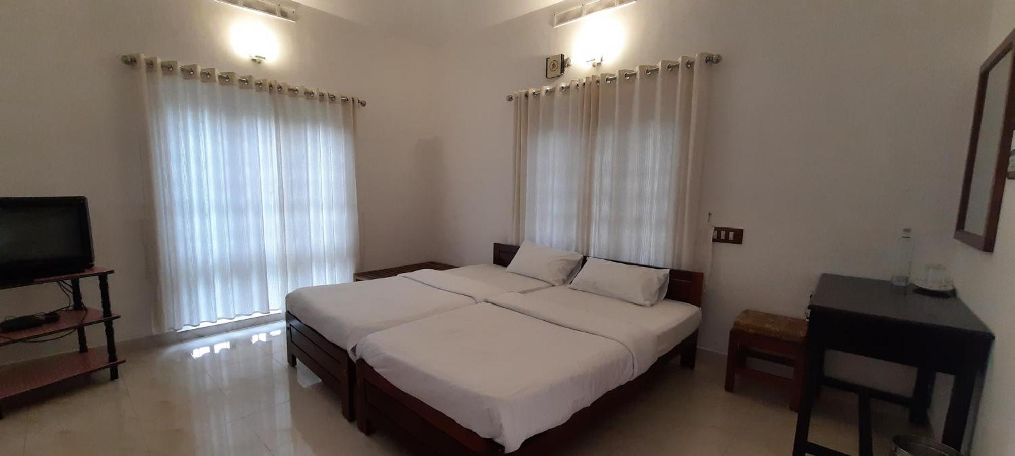 Oriole Homestay Теккади Экстерьер фото