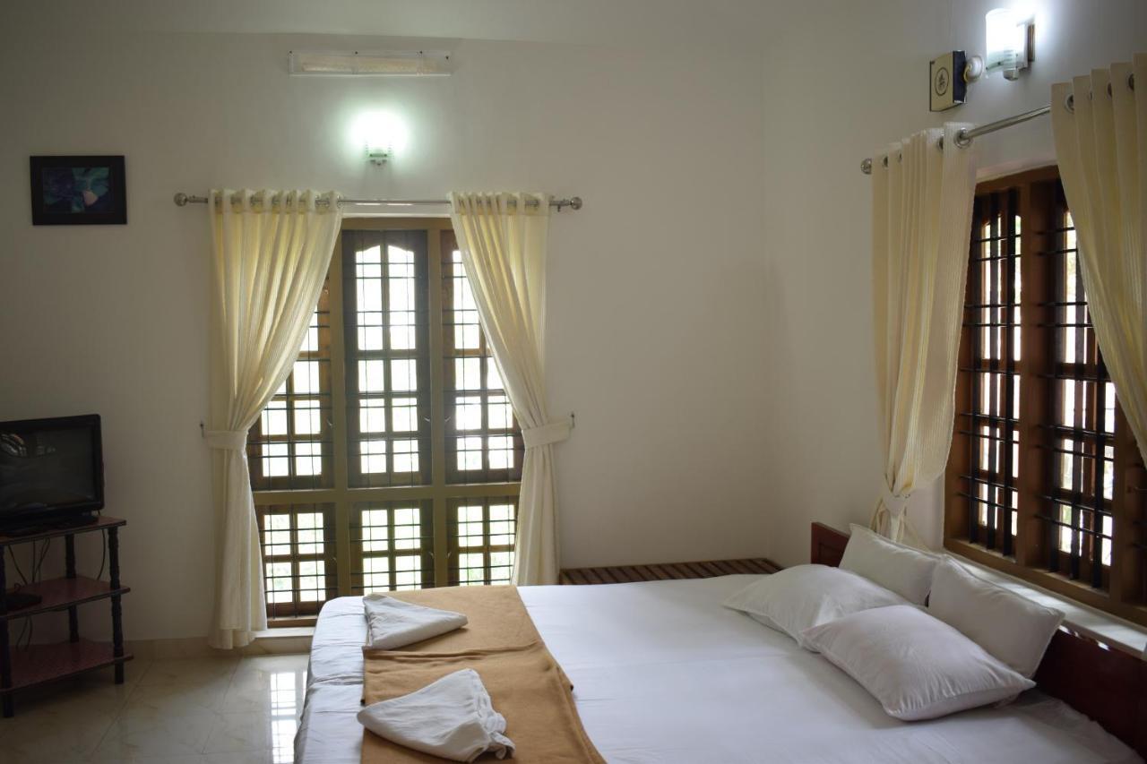 Oriole Homestay Теккади Экстерьер фото